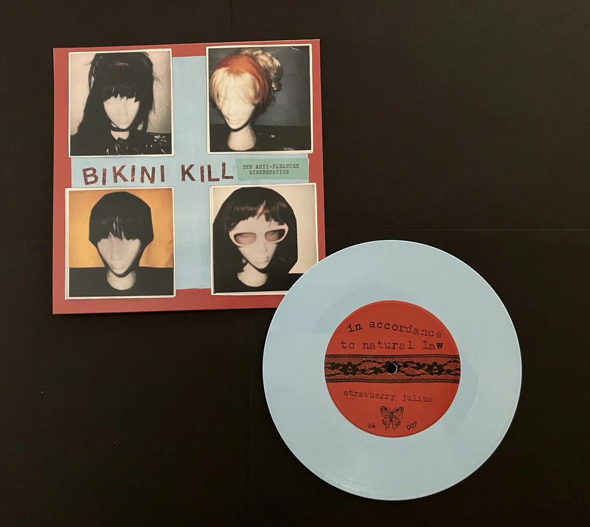 Bikini Kill - The Anti-Pleasure Dissertation (Limited Baby Blue 7" Vinyl)